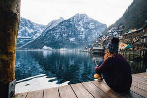 Lady looking over cold lake