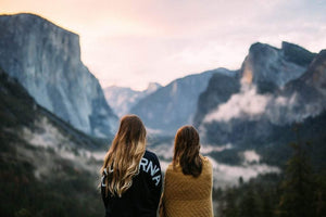 Two women looking at mountains