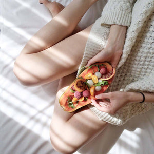 Lady holding fruit