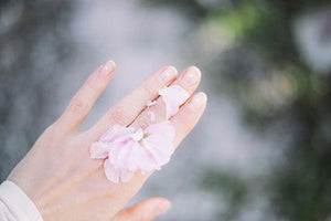 Flower petals on back of hand