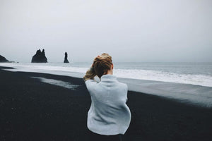 Lady looking at the sea